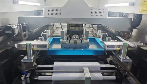 Transferring PCBs from automatic loader to solder paste printing machine